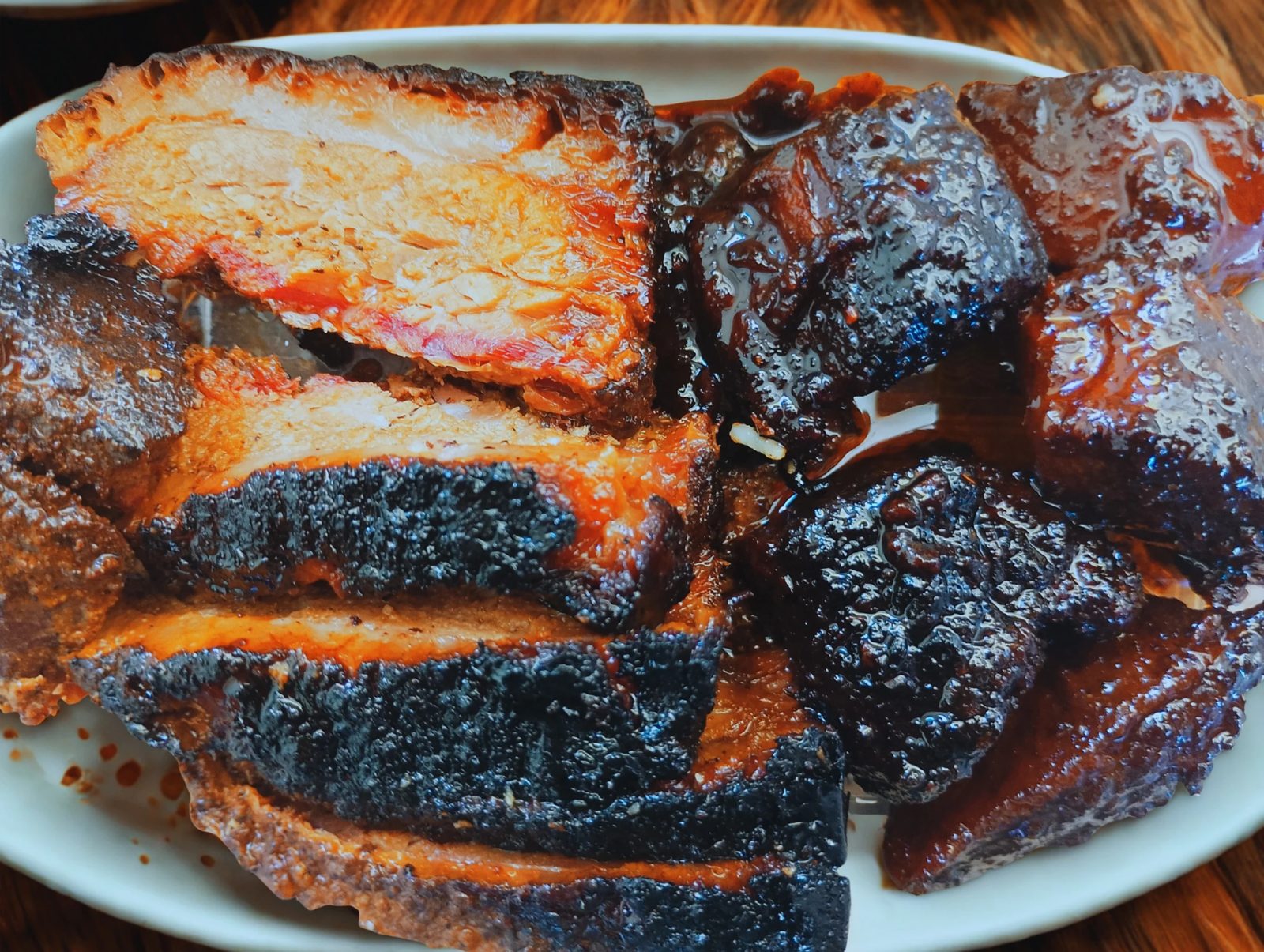 Sliced smoked brisket with dark bark